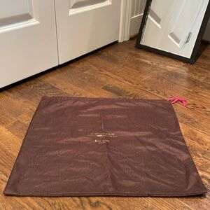 Kate Spade boot bag with quotation in gold